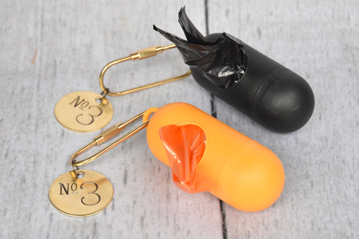 Capsule Poop Bag Holder